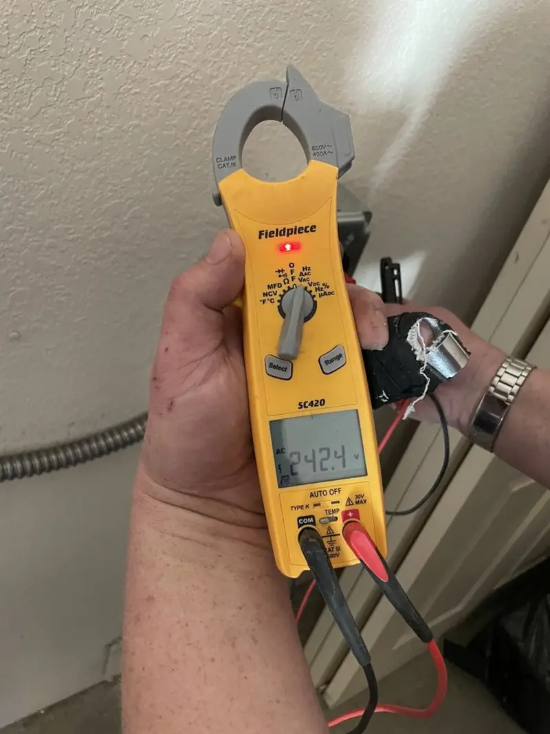 Voltage testing with clamp meter during Generator Installation in Church Point